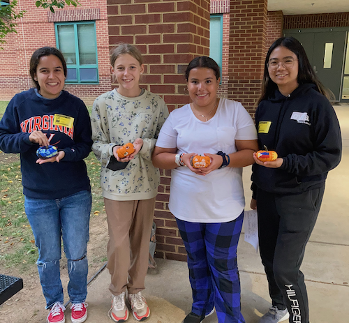 YWLP participants at Lakeside Middle School posing with painted pumpkins