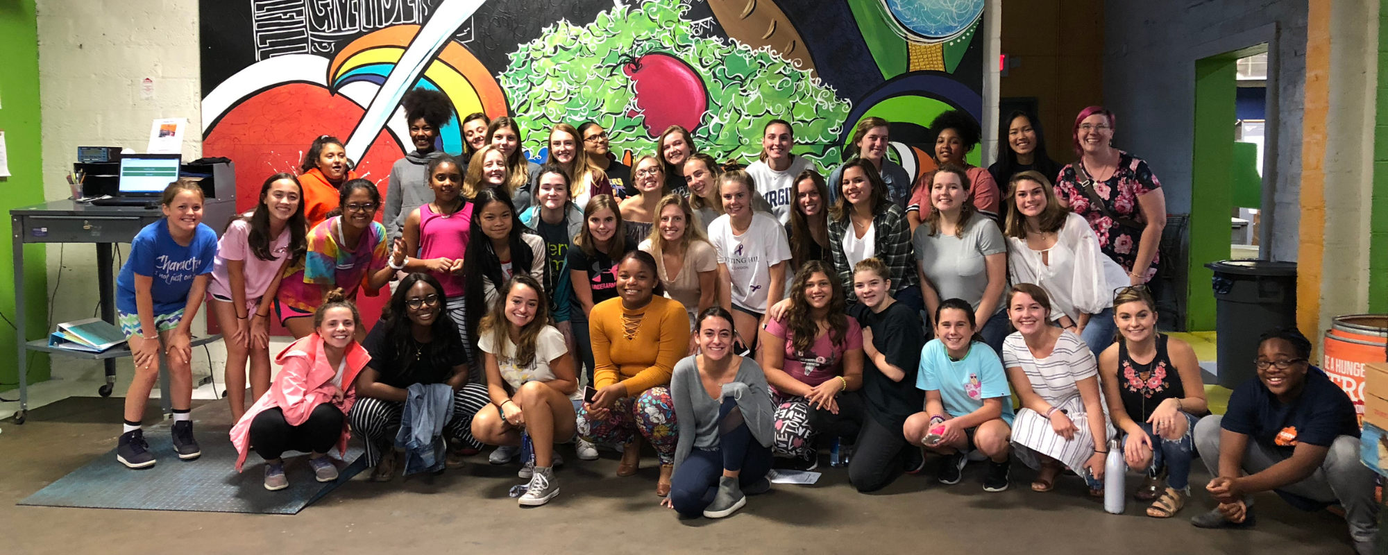 Group of YWLP students, mentors, and staff at Blue Ridge Area food bank