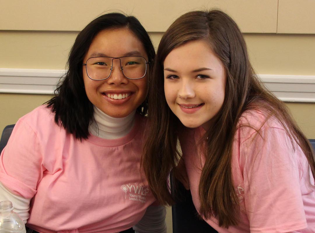 Leigh Kesser (left) with her YWLP little sister, Natalie Fabian (right). Leigh served with YWLP for three years, returning to the program as a mentoring group facilitator and an intern after getting her start as a Big Sister. 