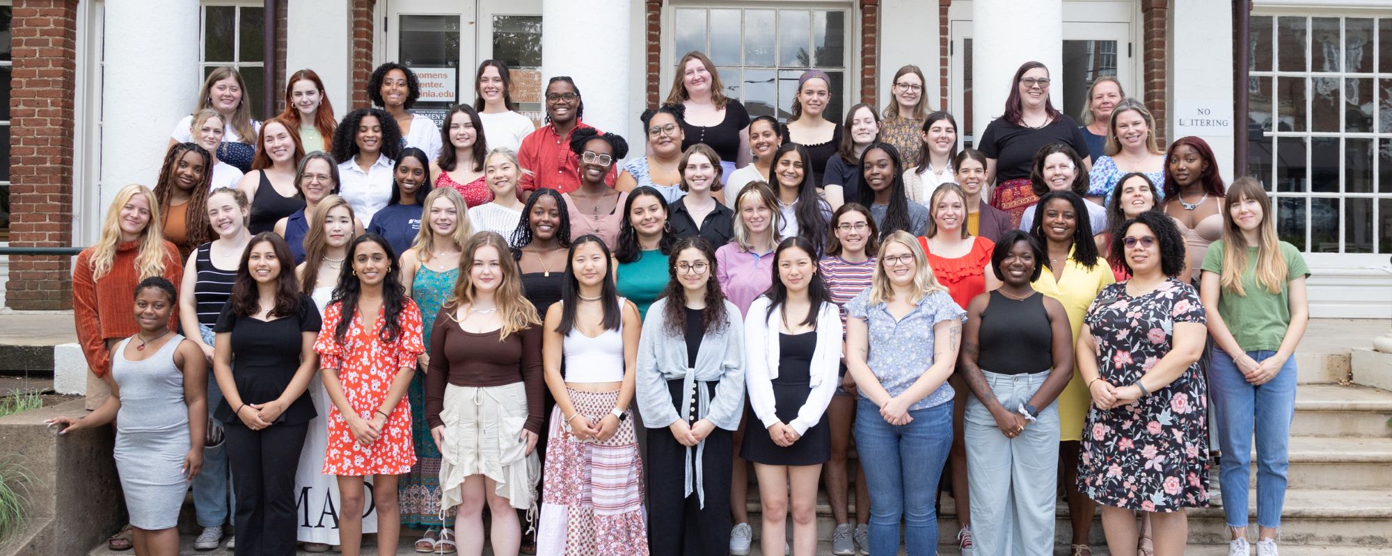 interns and staff in front of the women's center
