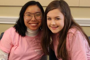 Leigh Kesser (left) with her YWLP little sister, Natalie Fabian (right). Leigh served with YWLP for three years, returning to the program as a mentoring group facilitator and an intern after getting her start as a Big Sister. 